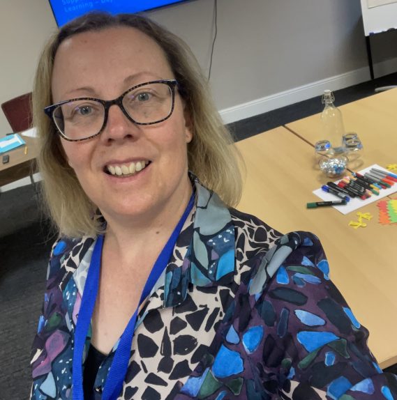 A selfie of Rebecca preparing a Workplace Wellness workshop in Sheffield.