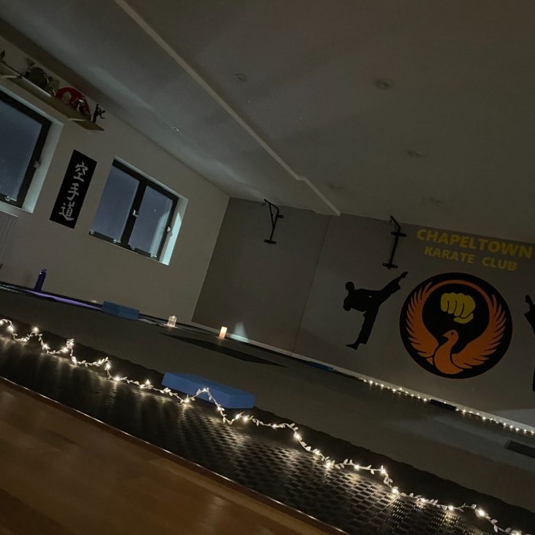 Interior shot of the studio where the Serenity Sessions are held. The room is low-lit with fairy lights.