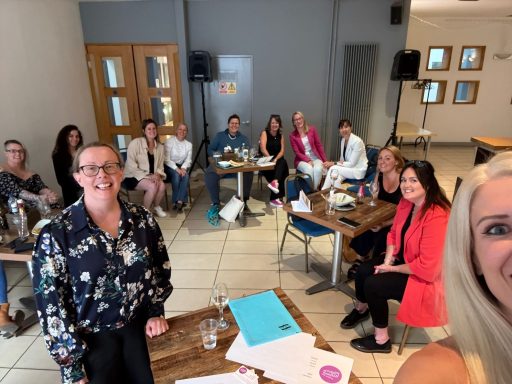 Women in Estate Agency Rebecca giving a wellness talk to a group of people from a local business in Sheffield.